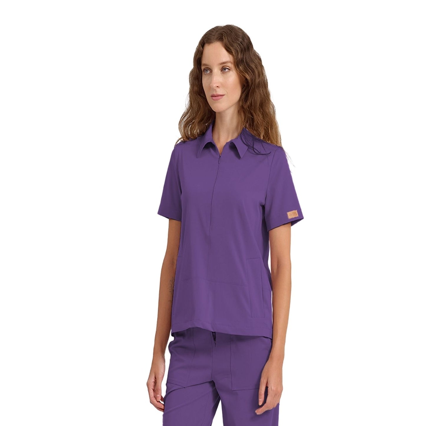 Brl Medinilla Women`s Medical Scrub Top in purple color for doctors and nurses from MedUniforms.store