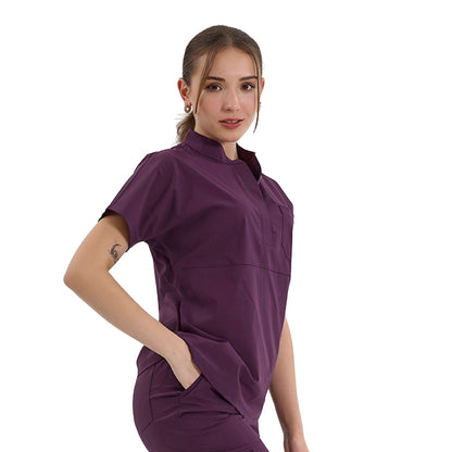 Brl SnapS Medical Scrub Top for female doctors and nurses in color plum at meduniforms.store